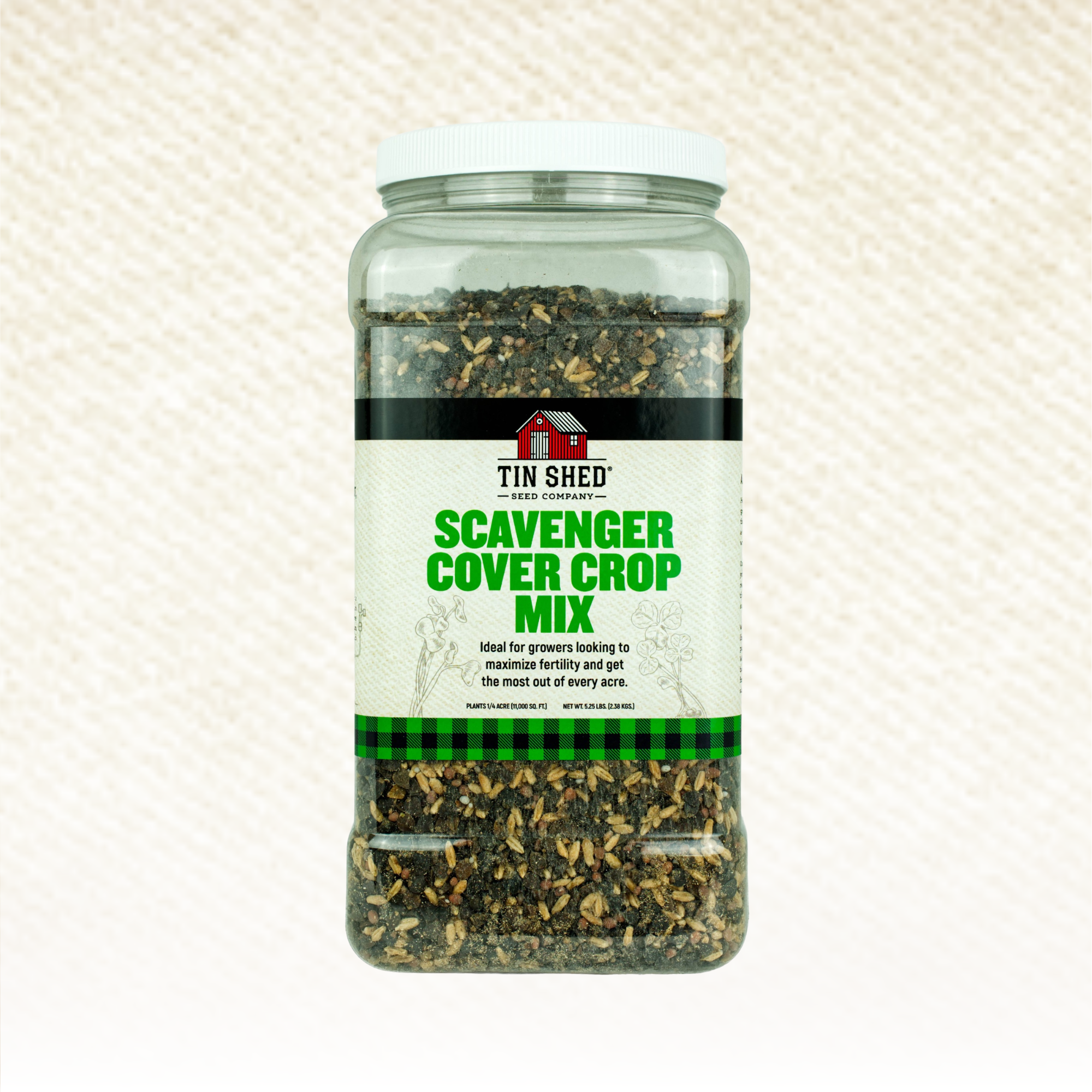 Jar of Tin Shed Scavenger Cover Crop Mix on a textured beige background