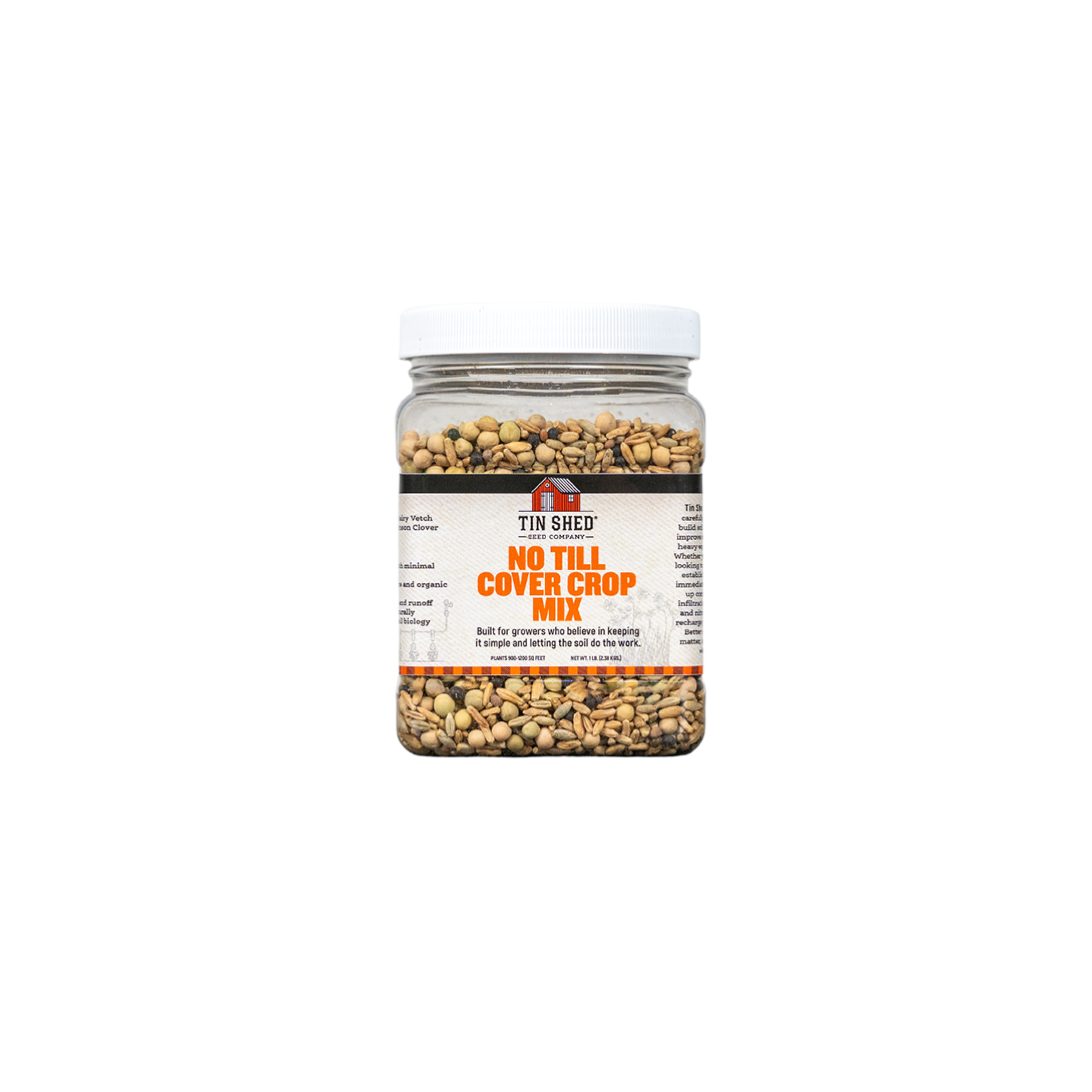 Jar of no till cover crop mix on a white background